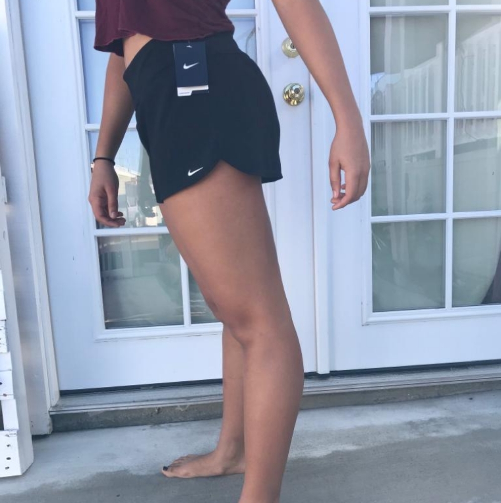 Black Nike running shorts